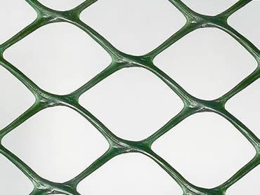 The close-up of dark green diamond-shape extruded plastic mesh